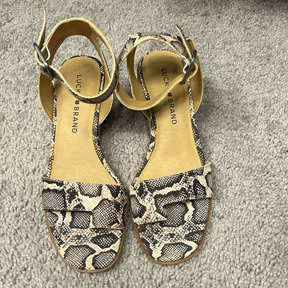 Lucky Brand Snake Print Sandal. Block heel. Leather upper.